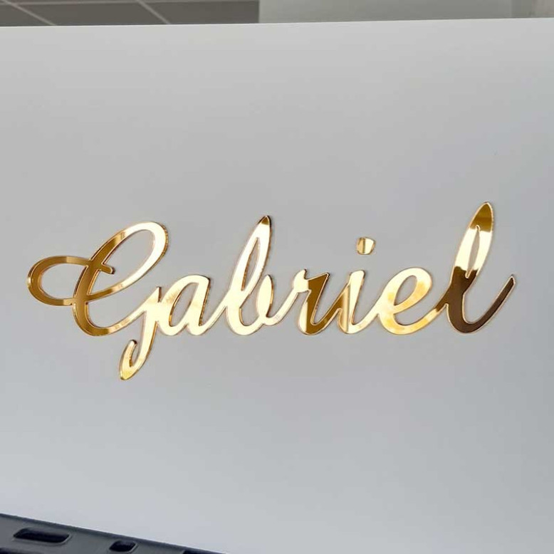 Mot découpé dans un miroir Or