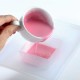 mettre le savon couleur rose au micro-onde