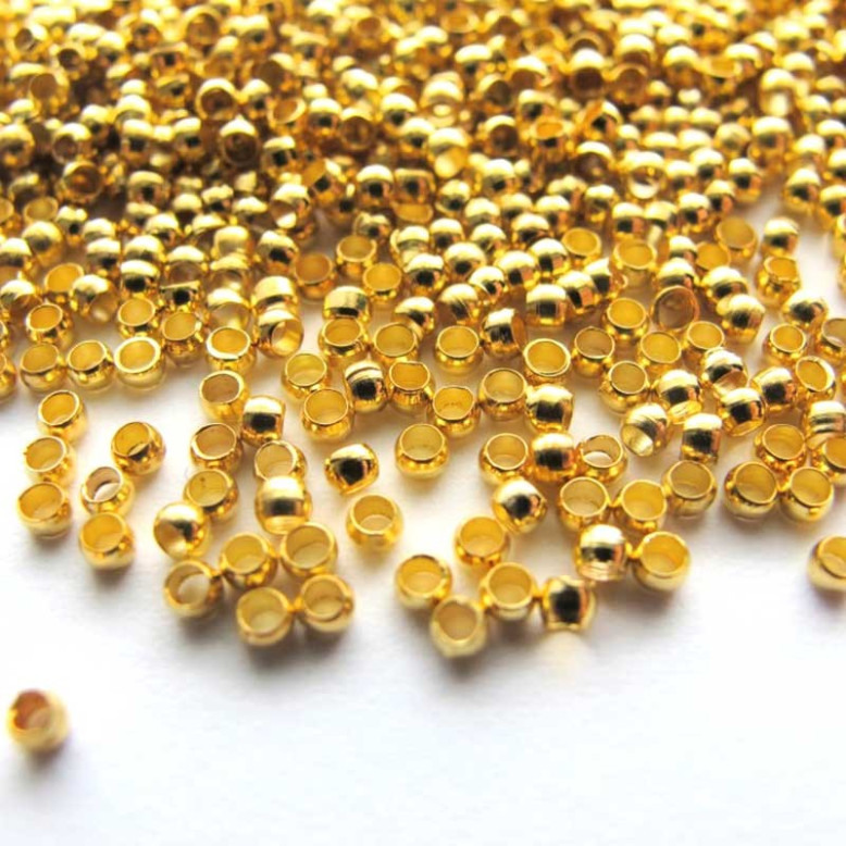 Sachet de 60 perles a ecraser coloris or 2mm Sachet de 60 perles a ecraser coloris or 2mm